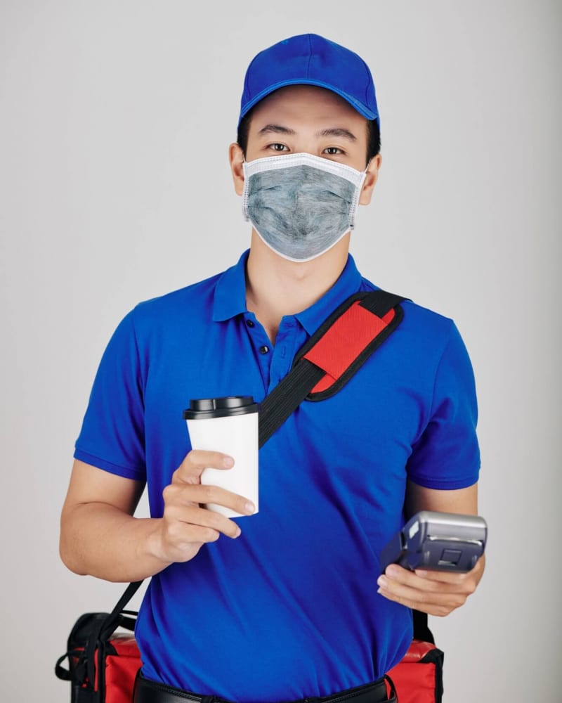 cheerful-courier-with-cup-of-coffee-1.jpg